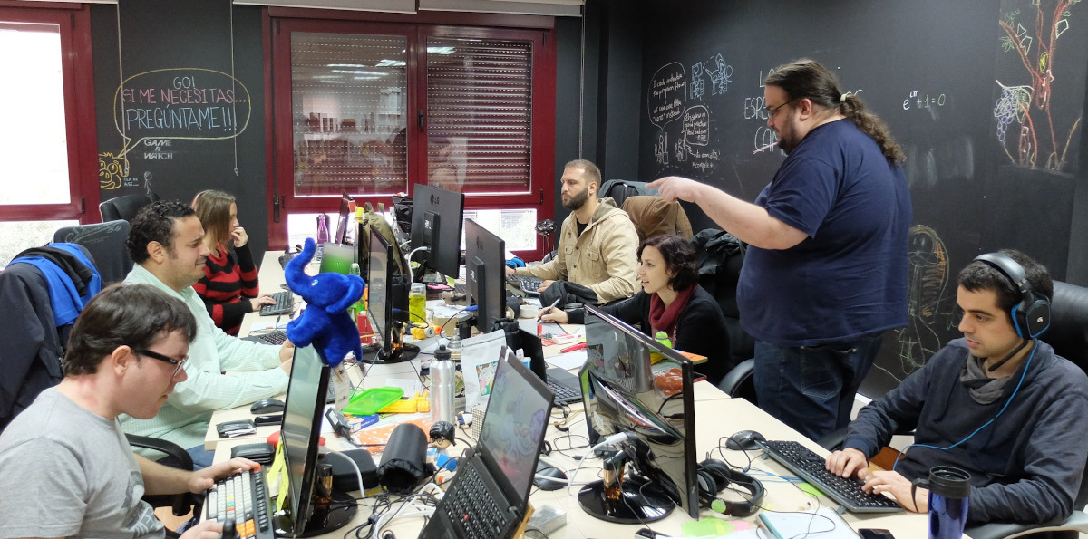 Kaleidos office with several people at their desks working